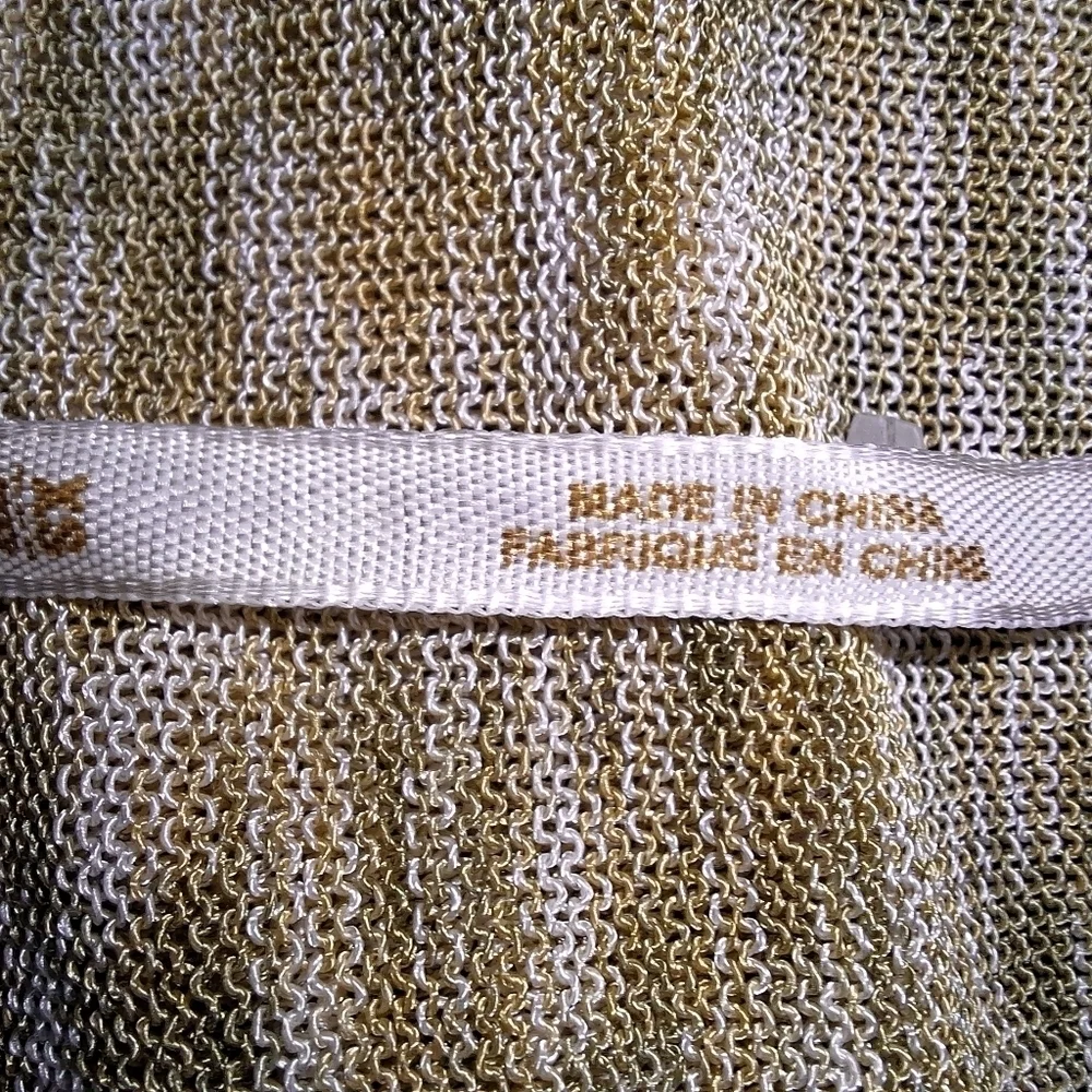 A Free People long length semi-sheer cardigan in a ladies' size XS. EUC.